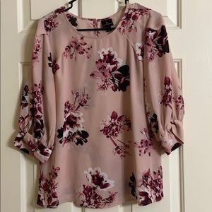 Mauve flowered top. 100% polyester.